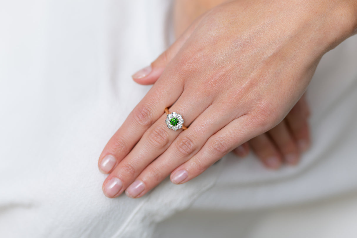 Edwardian, 18ct gold, demantoid garnet and diamond cluster ring