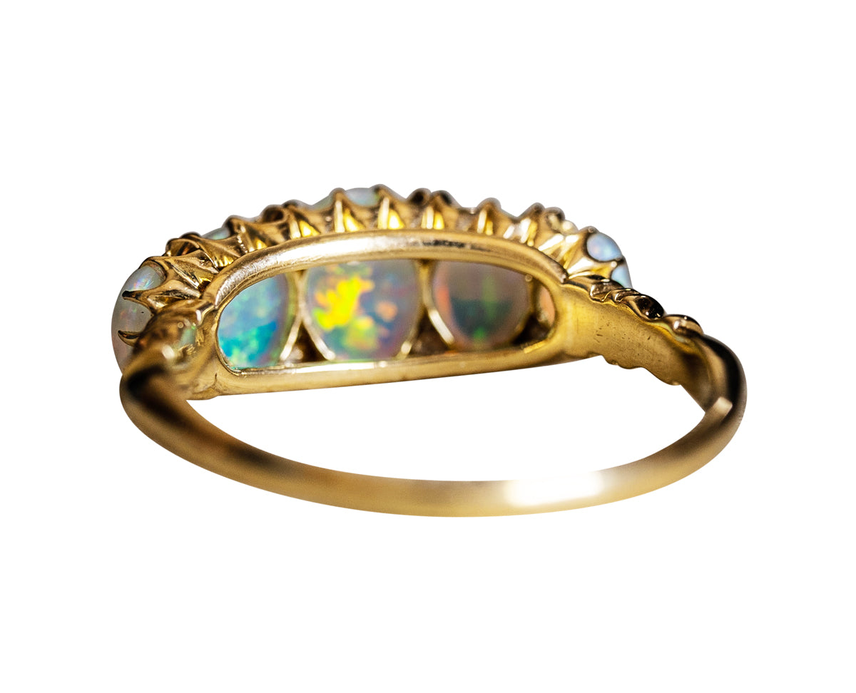 Edwardian, 18ct gold, opal and diamond five-stone ring