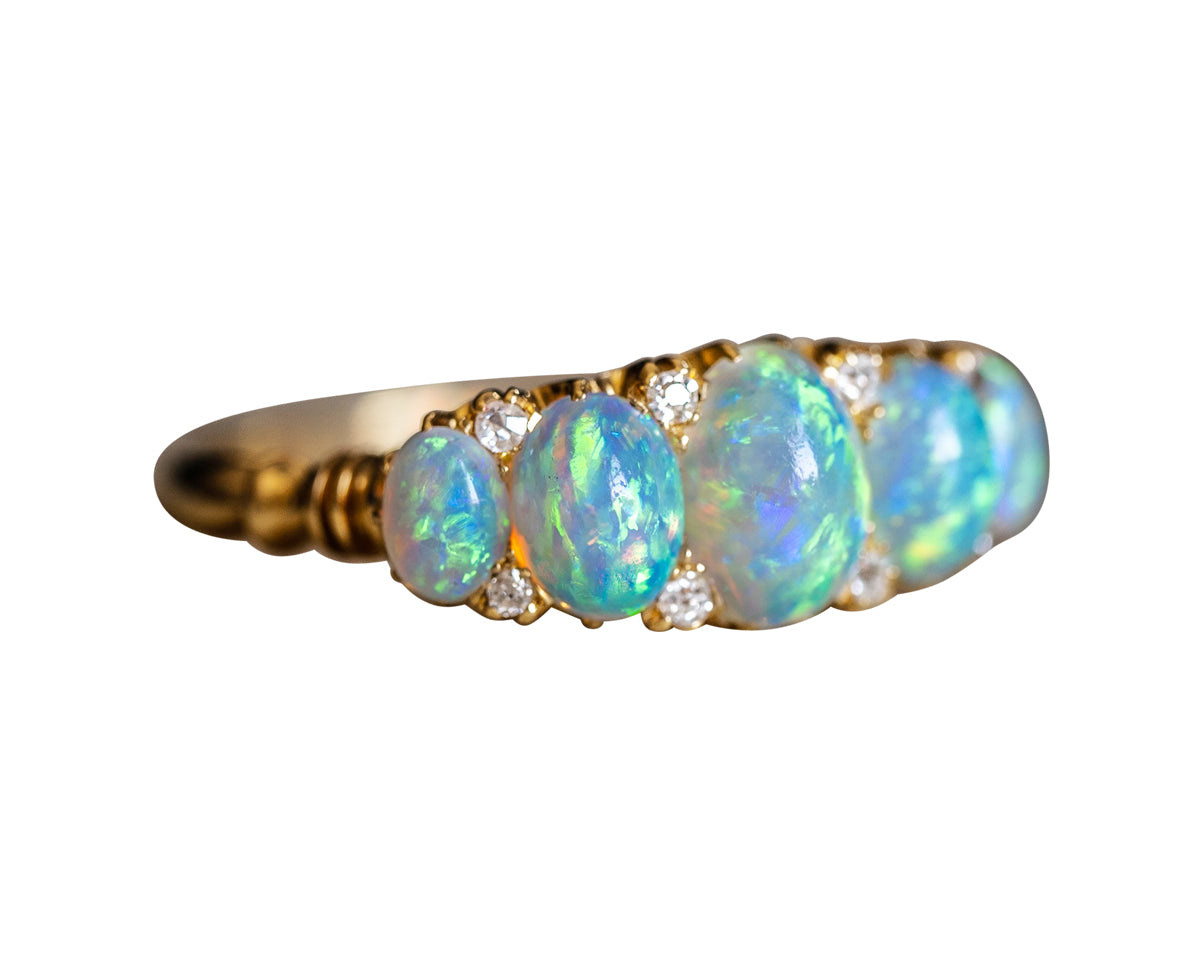 Edwardian, 18ct gold, opal and diamond five-stone ring