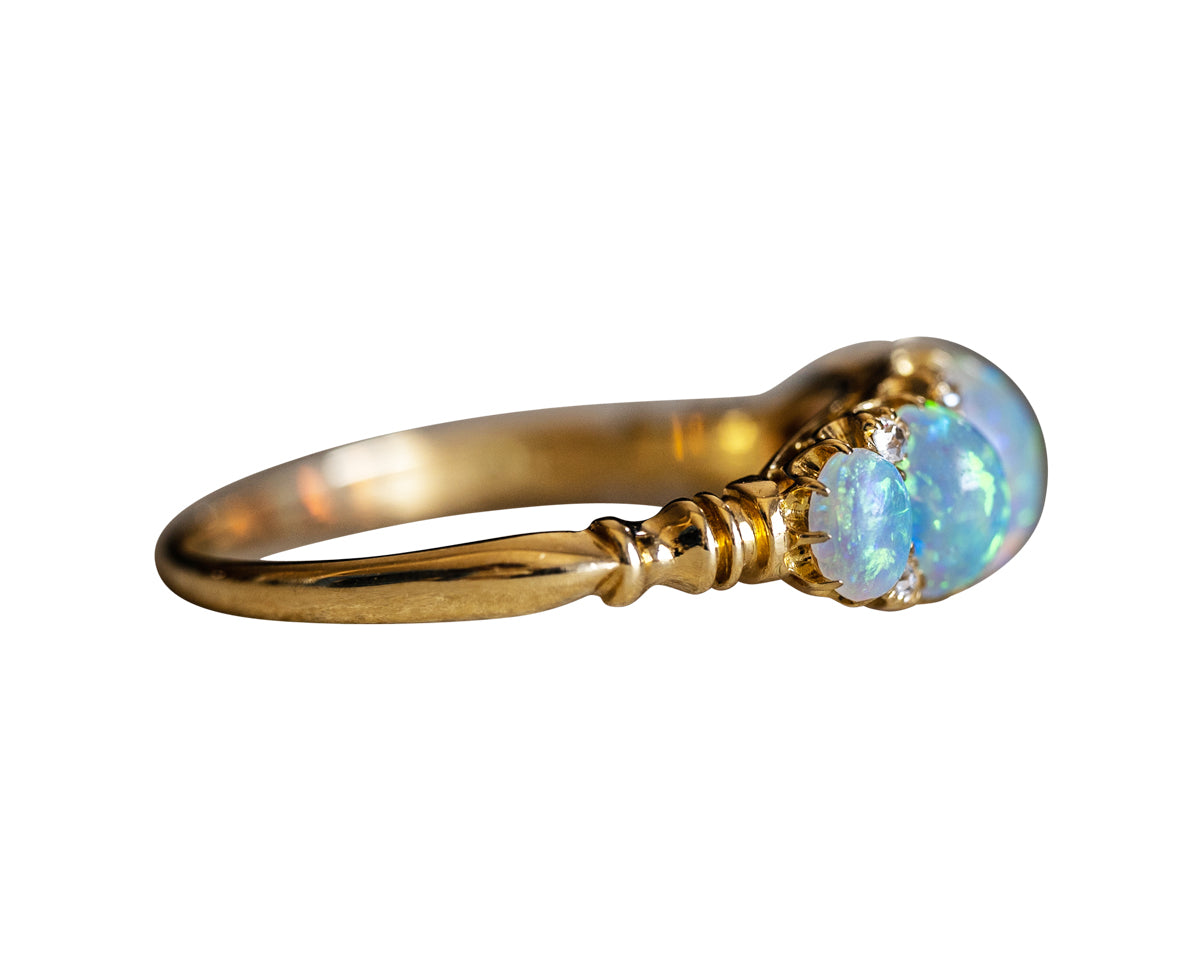 Edwardian, 18ct gold, opal and diamond five-stone ring