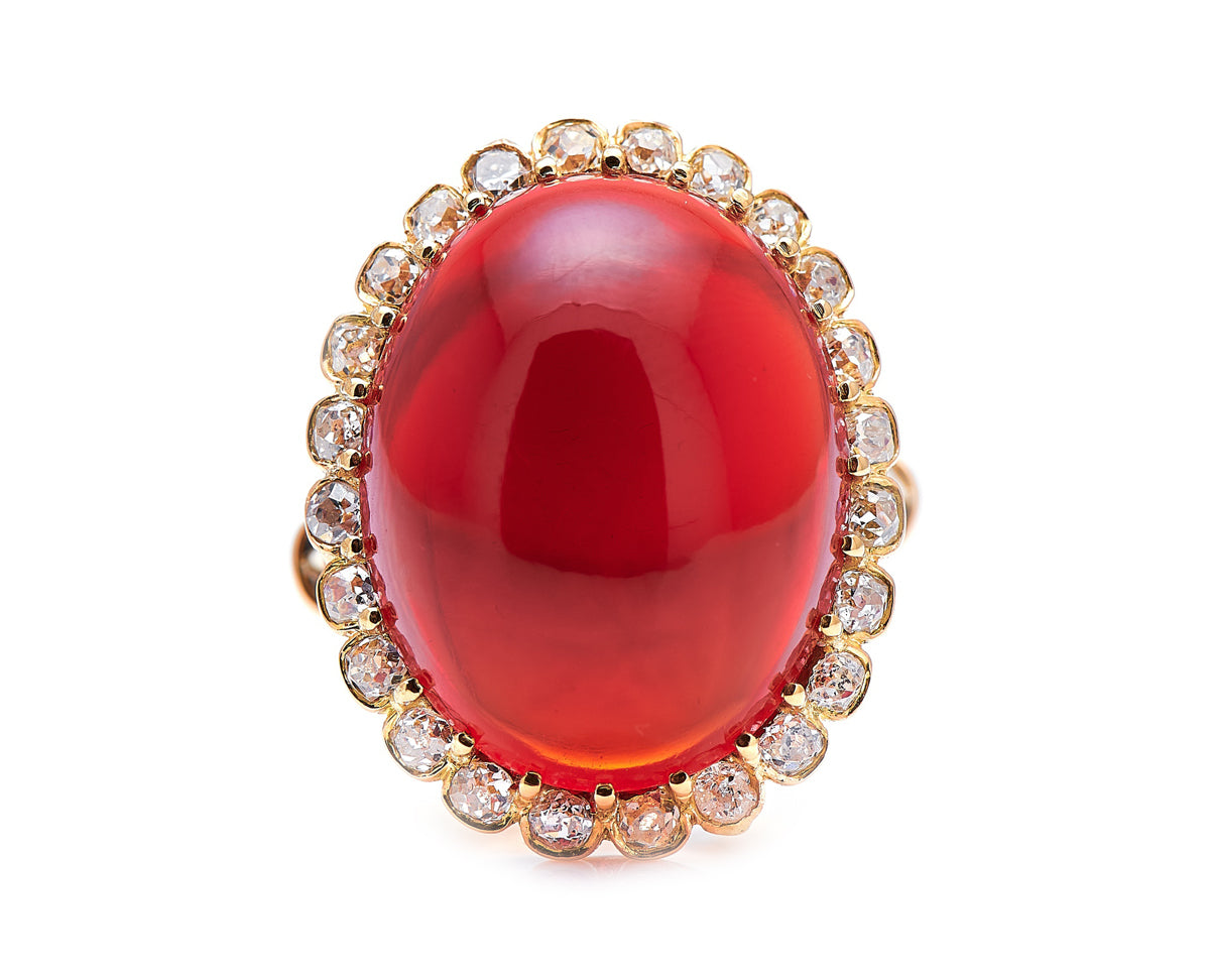 Edwardian, 18ct yellow gold, cabochon fire opal and diamond cluster ring