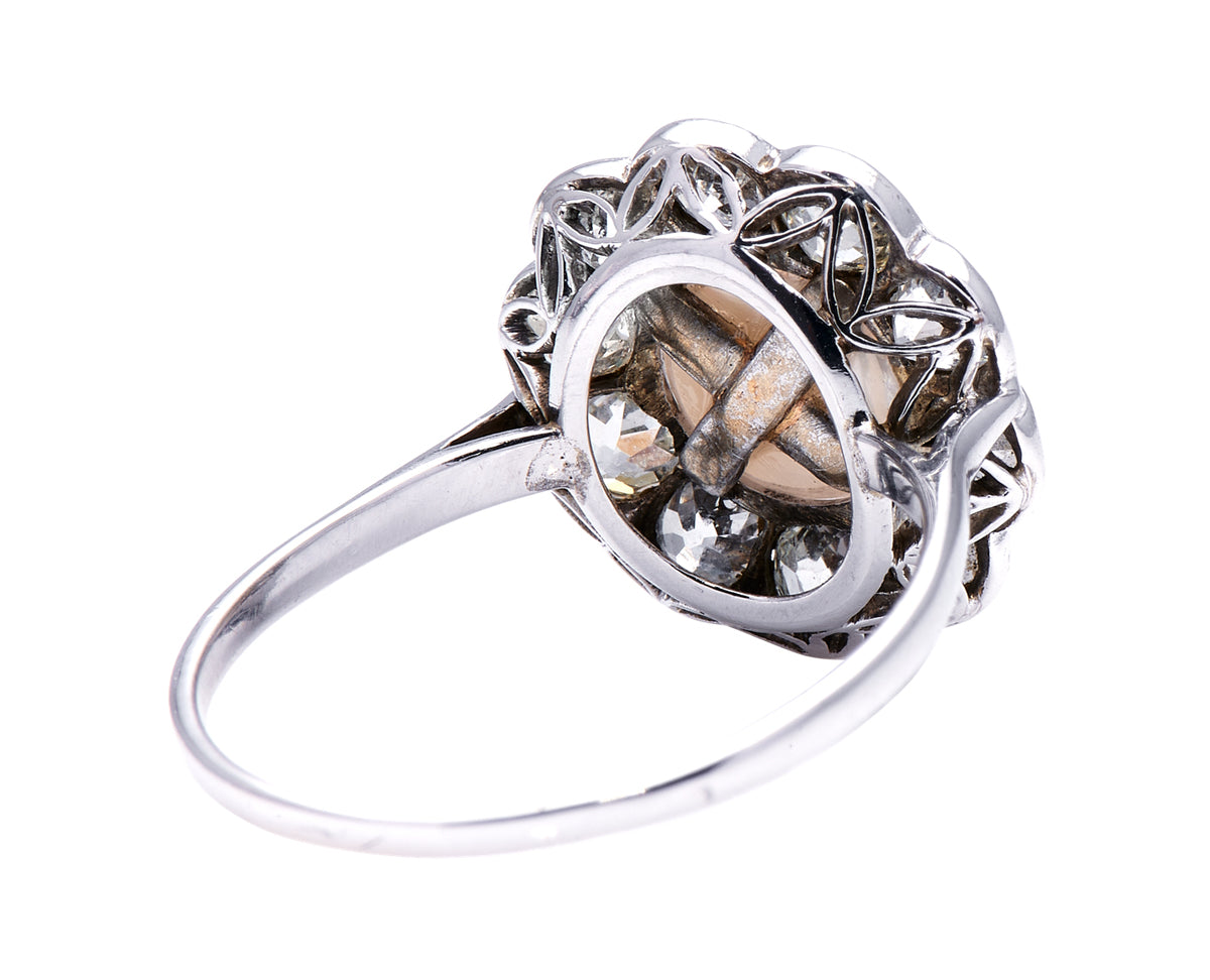 Edwardian, platinum, natural pearl and diamond cluster ring