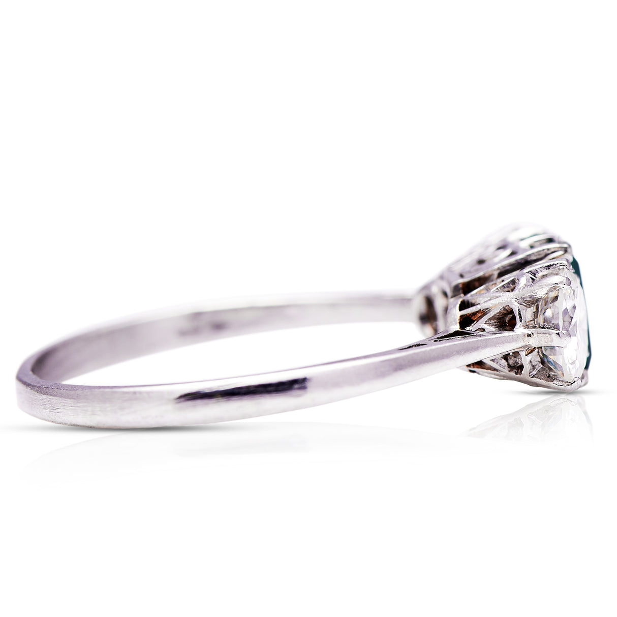 Fine quality | Art Deco, platinum, emerald & diamond three-stone ring
