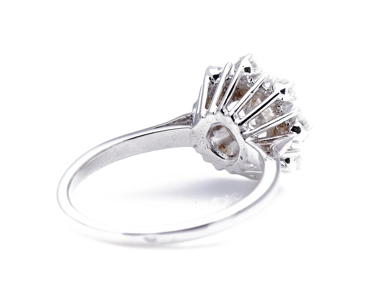 French, 1950s, 18ct white gold, diamond cluster engagement ring
