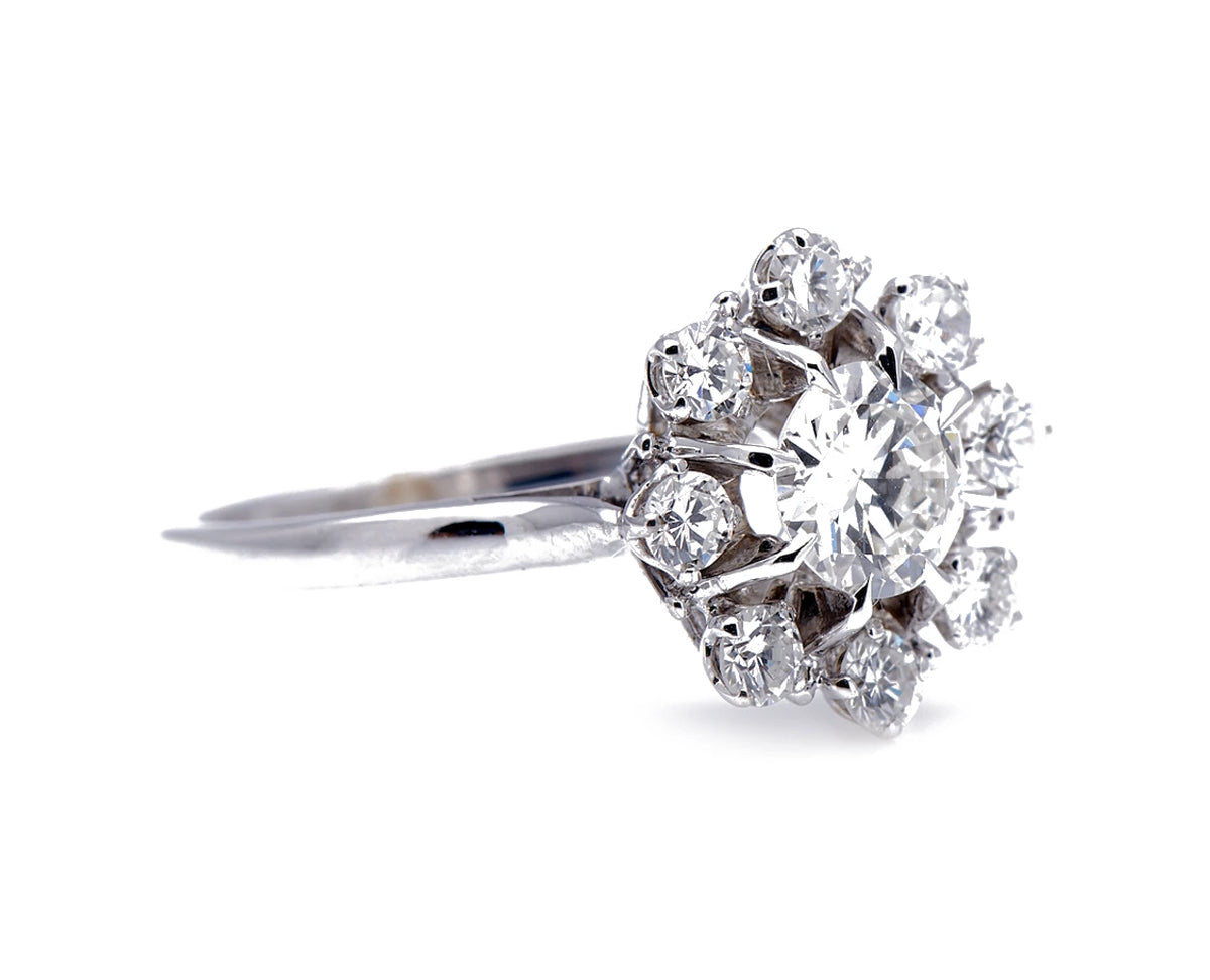 French, 1950s, 18ct white gold, diamond cluster engagement ring