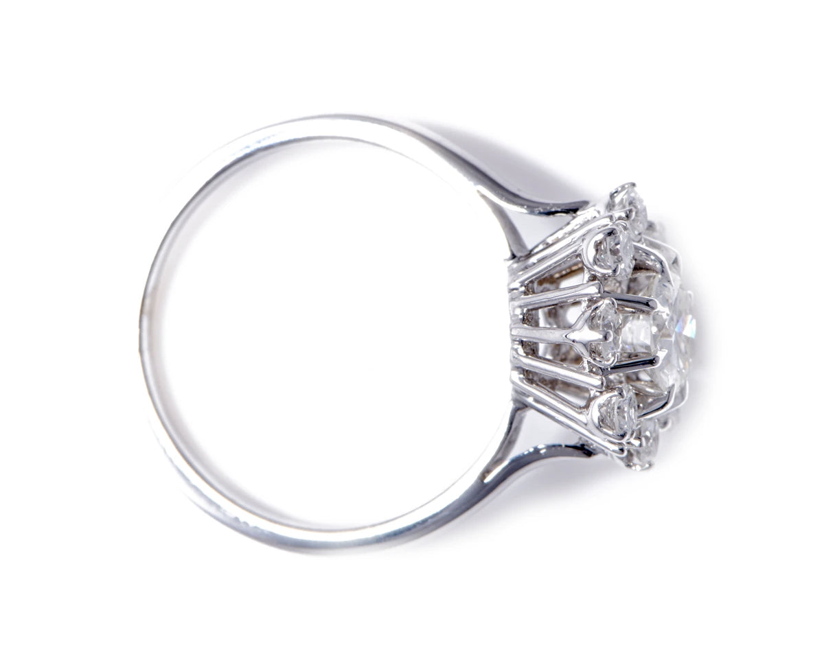 French, 1950s, 18ct white gold, diamond cluster engagement ring