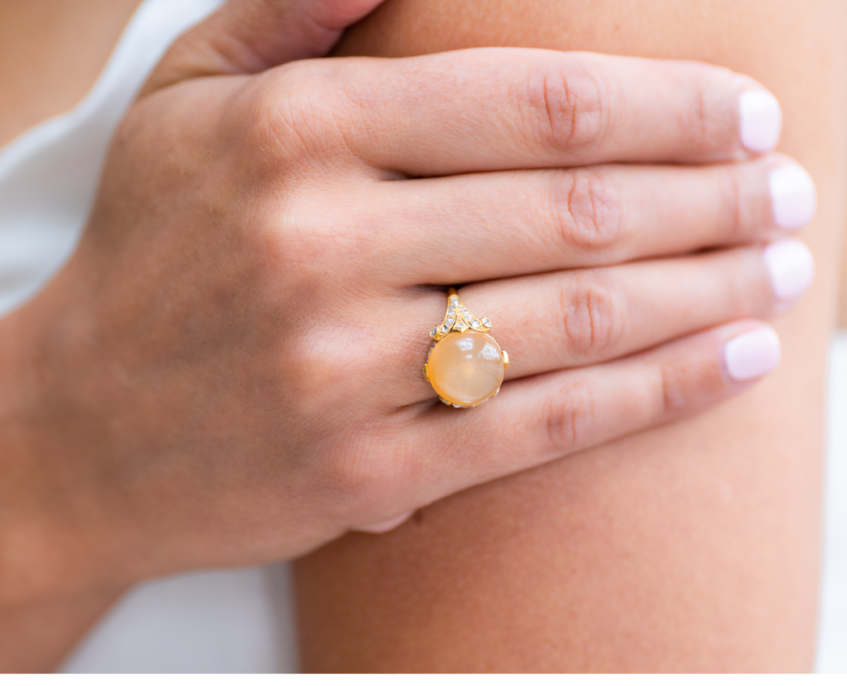 Belle Époque, cabochon peach moonstone & diamond ring