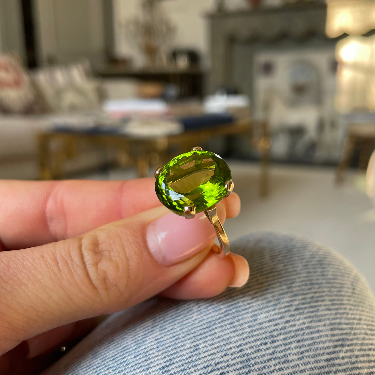 French | a large oval 12ct peridot ring, 18ct gold