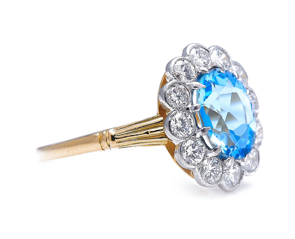 Mid century, 18ct gold, aquamarine and diamond cluster ring