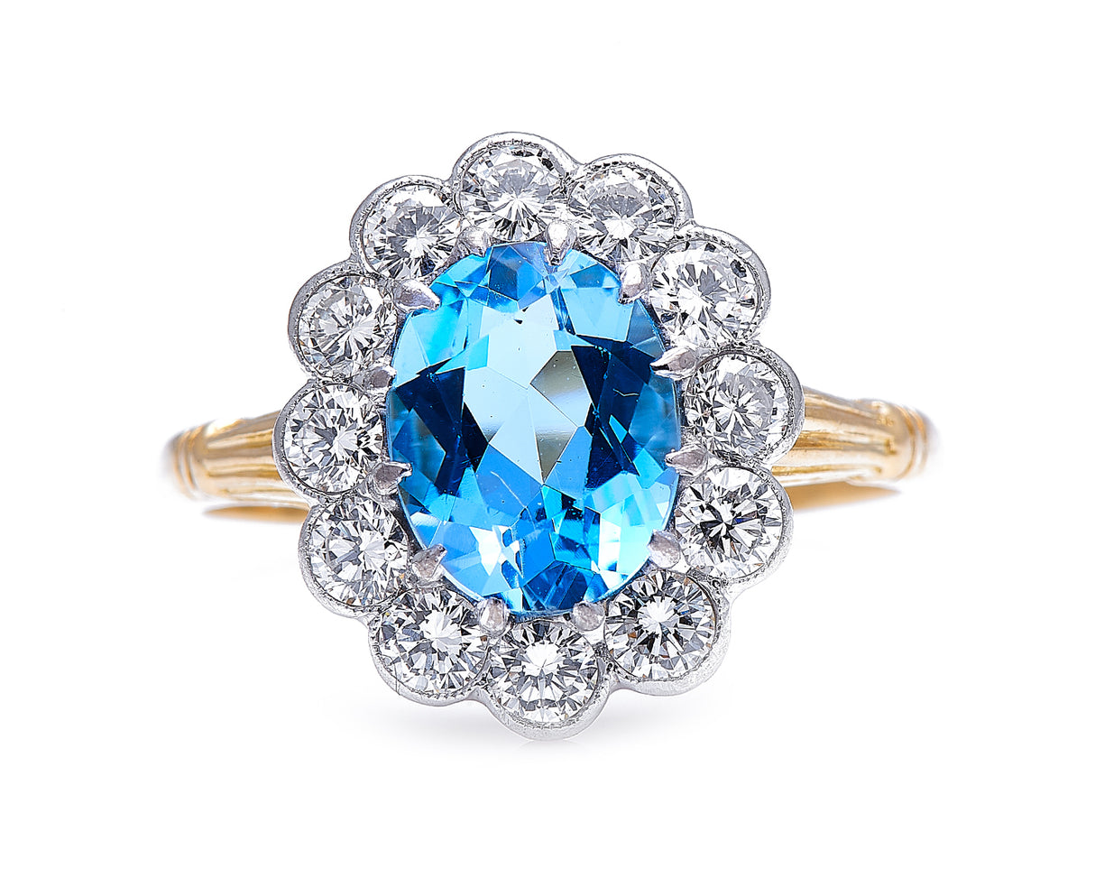 Mid century, 18ct gold, aquamarine and diamond cluster ring