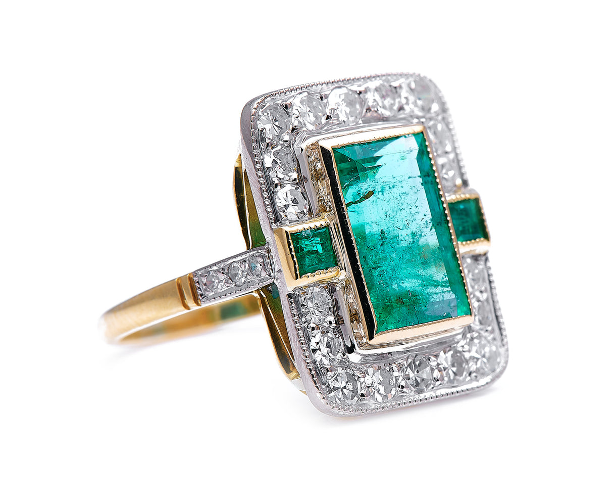 Mid century, 18ct gold, emerald and diamond cluster ring