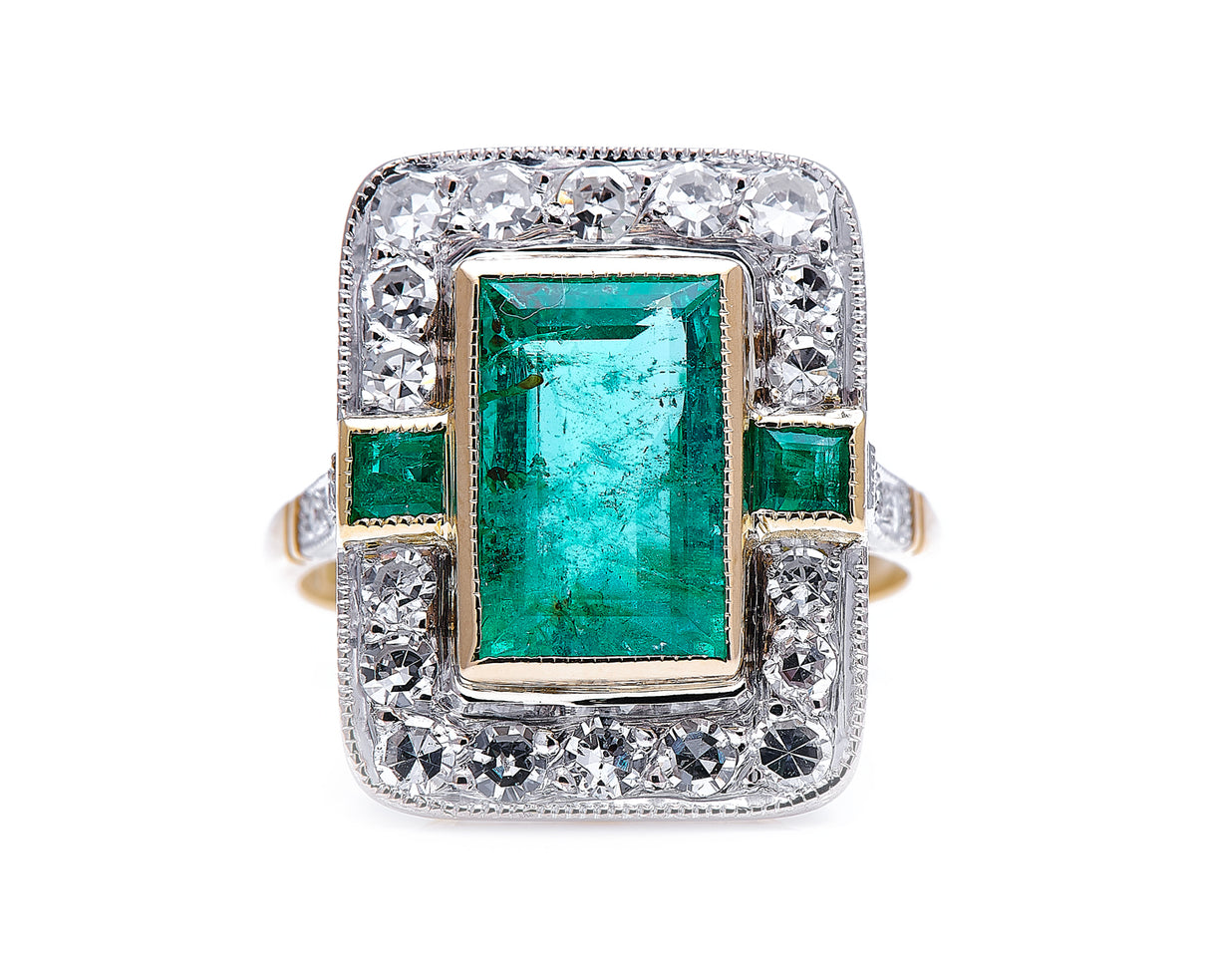 Mid century, 18ct gold, emerald and diamond cluster ring