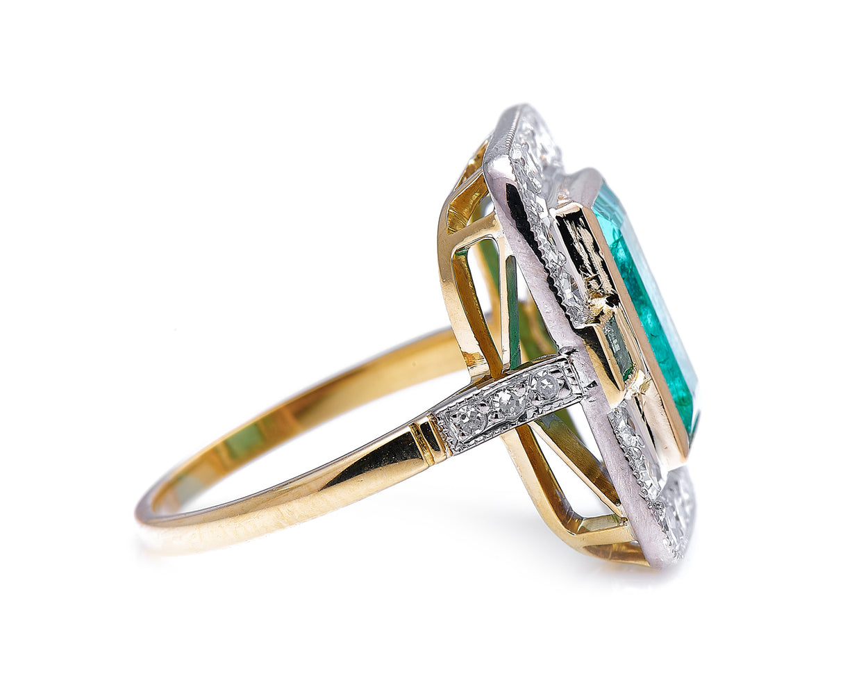 Mid century, 18ct gold, emerald and diamond cluster ring