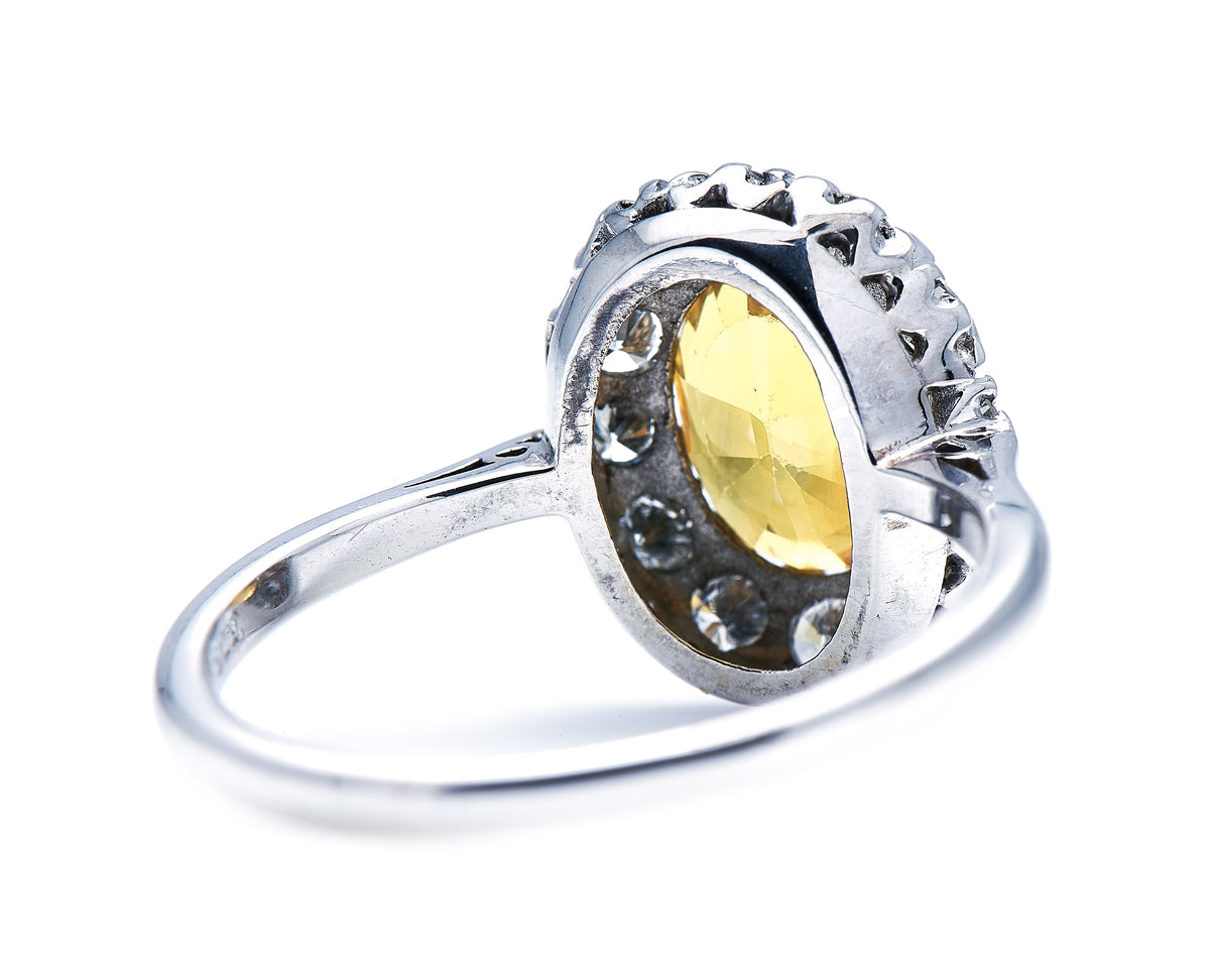 Mid century, 18ct white gold, yellow sapphire and diamond ring