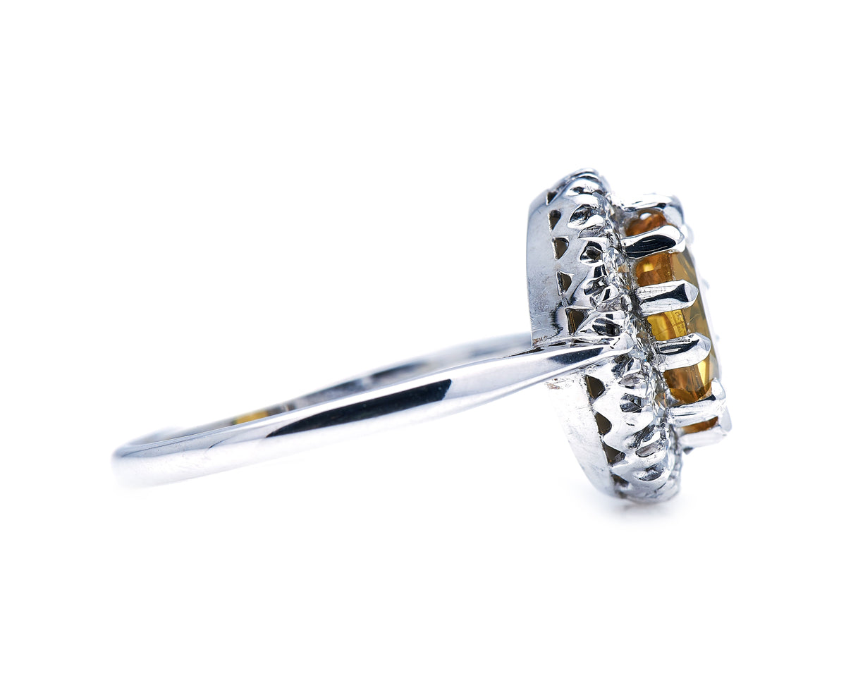 Mid century, 18ct white gold, yellow sapphire and diamond ring