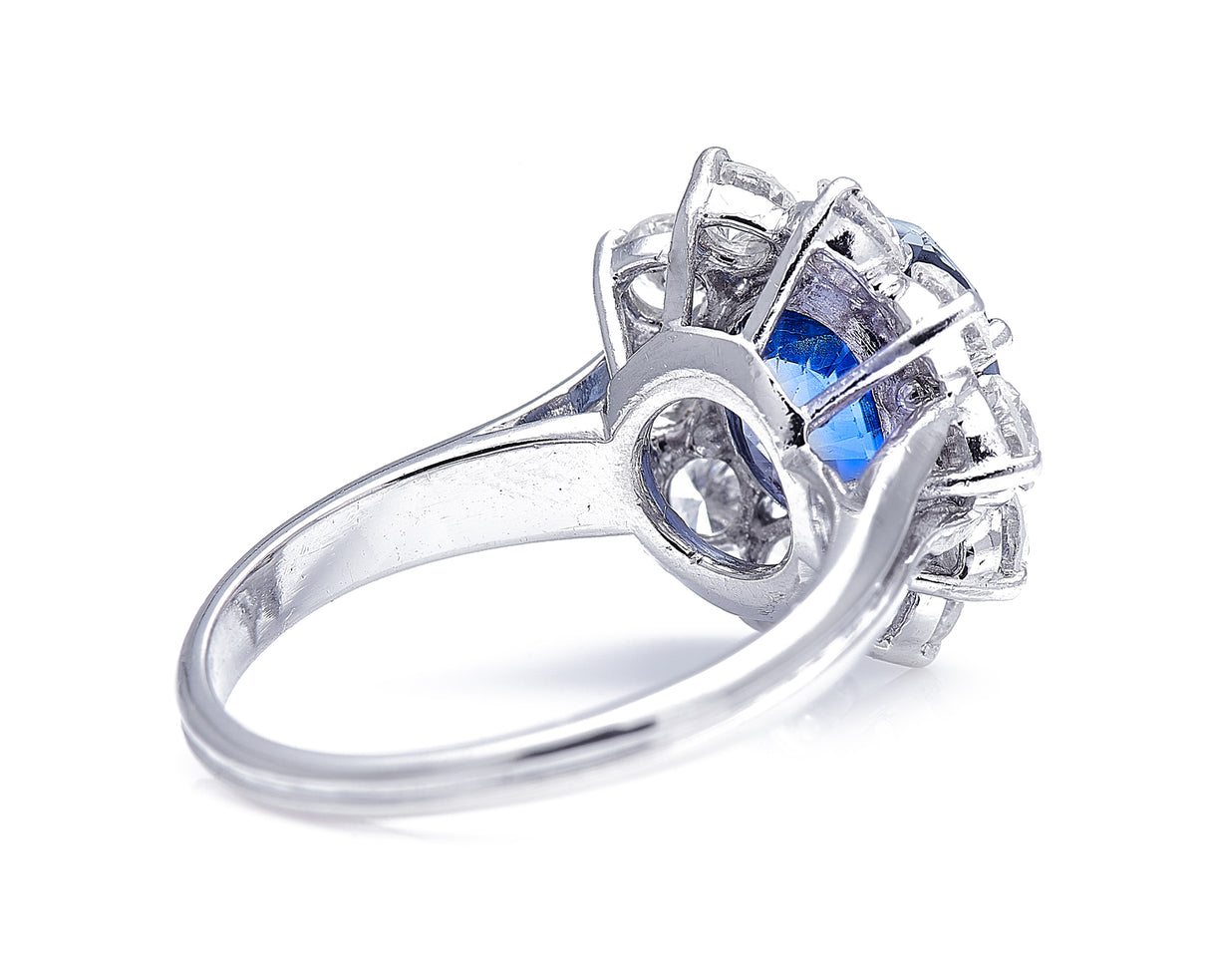 Mid century, platinum, cornflower blue sapphire and diamond cluster ring