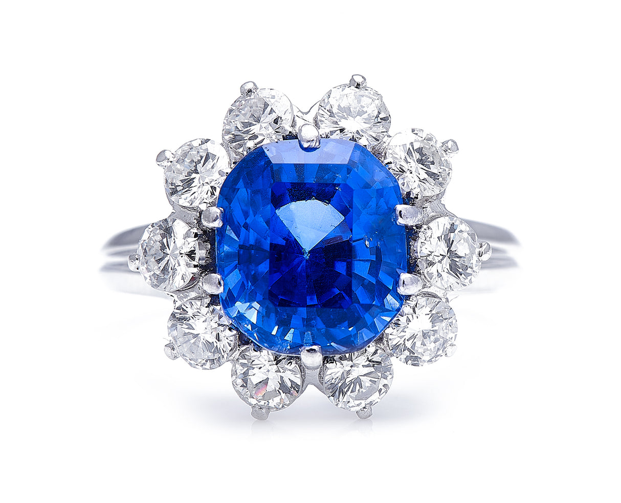 Mid century, platinum, cornflower blue sapphire and diamond cluster ring