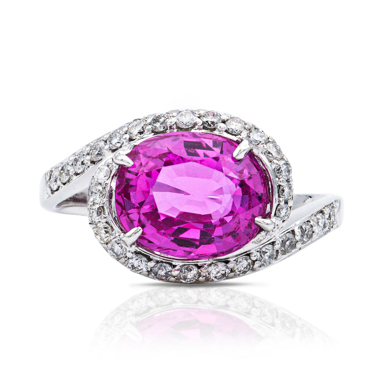 Pink sapphire and diamond engagement ring, front view.