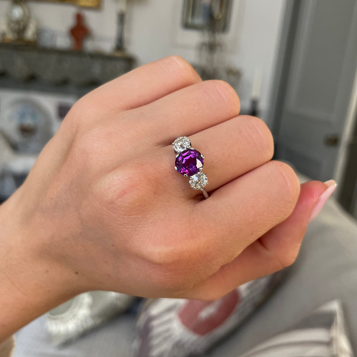 Art Deco, purple sapphire and diamond three-stone engagement ring, platinum