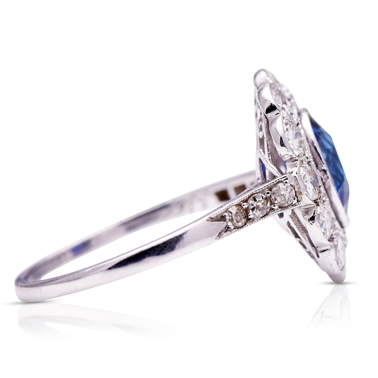 Edwardian_Platinum | Sapphire_Diamond Cluster Ring | Antique_Engagement_Rings | Sapphire_rings | Sapphire_ring | Sapphire_and_diamond rings | Sapphire_engagement_ring | Sapphire_engagement_rings | Sapphire and diamond engagement ring. Sapphire and diamond engagement rings. Platinum sapphire ring. Antique sapphire ring. Antique sapphire rings.
