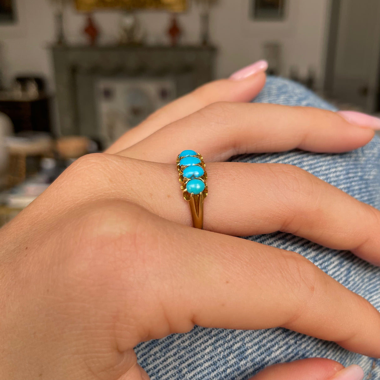 Victorian turquoise half hoop ring, worn on hand.