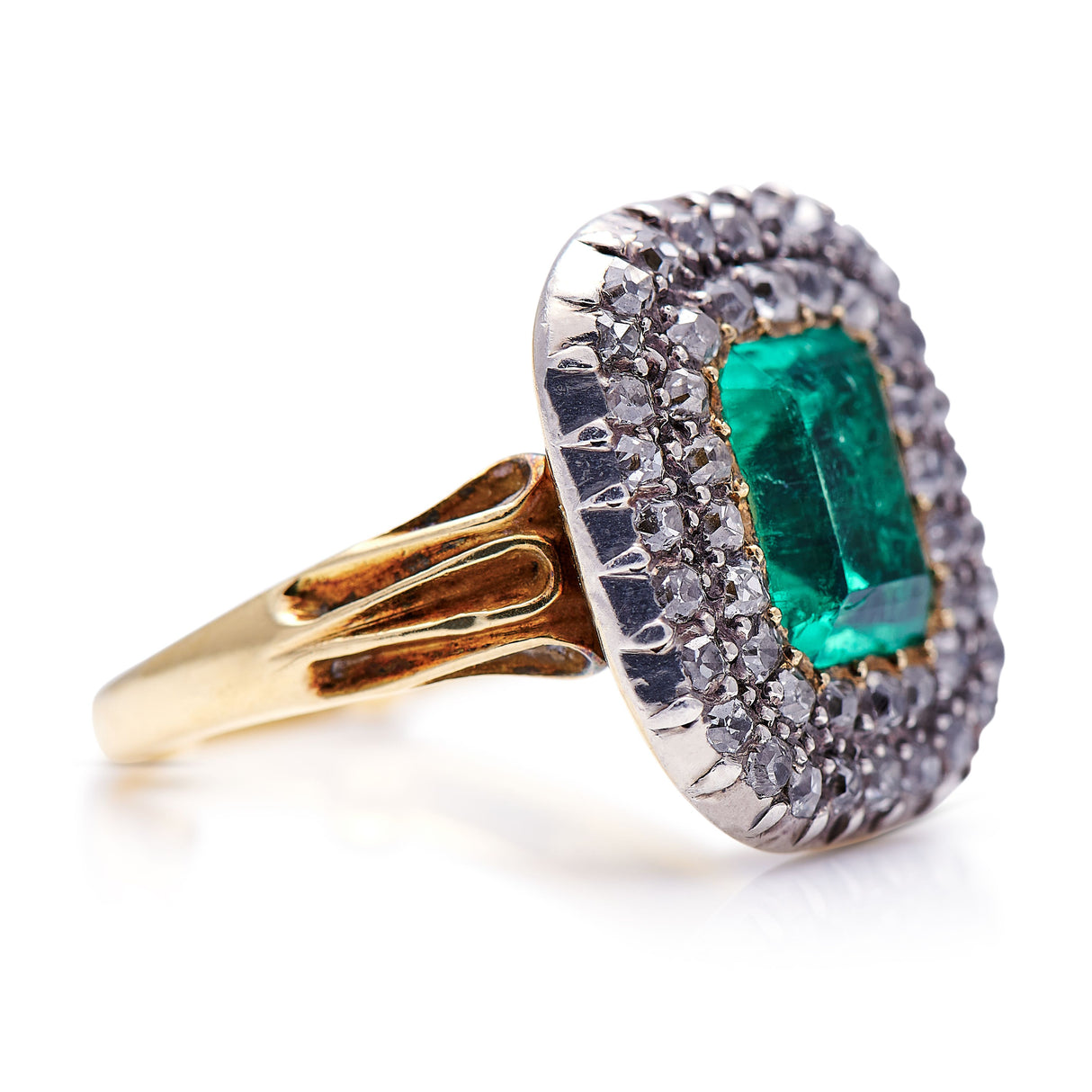 Georgian emerald and diamond cluster, side view.