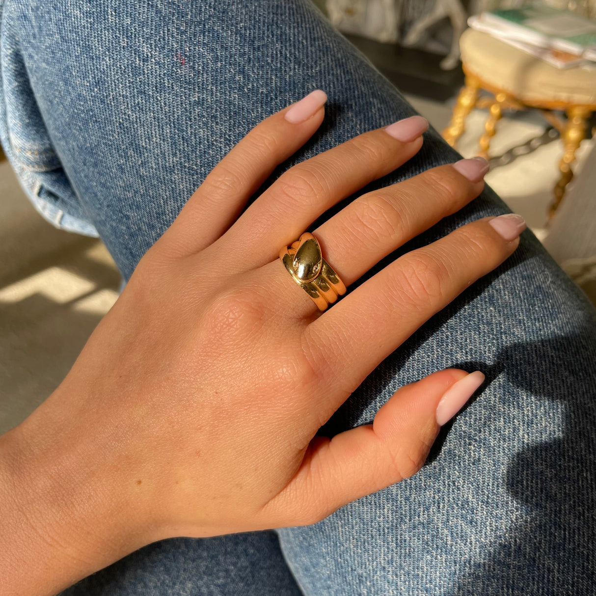 Victorian diamond set snake ring, worn on hand.