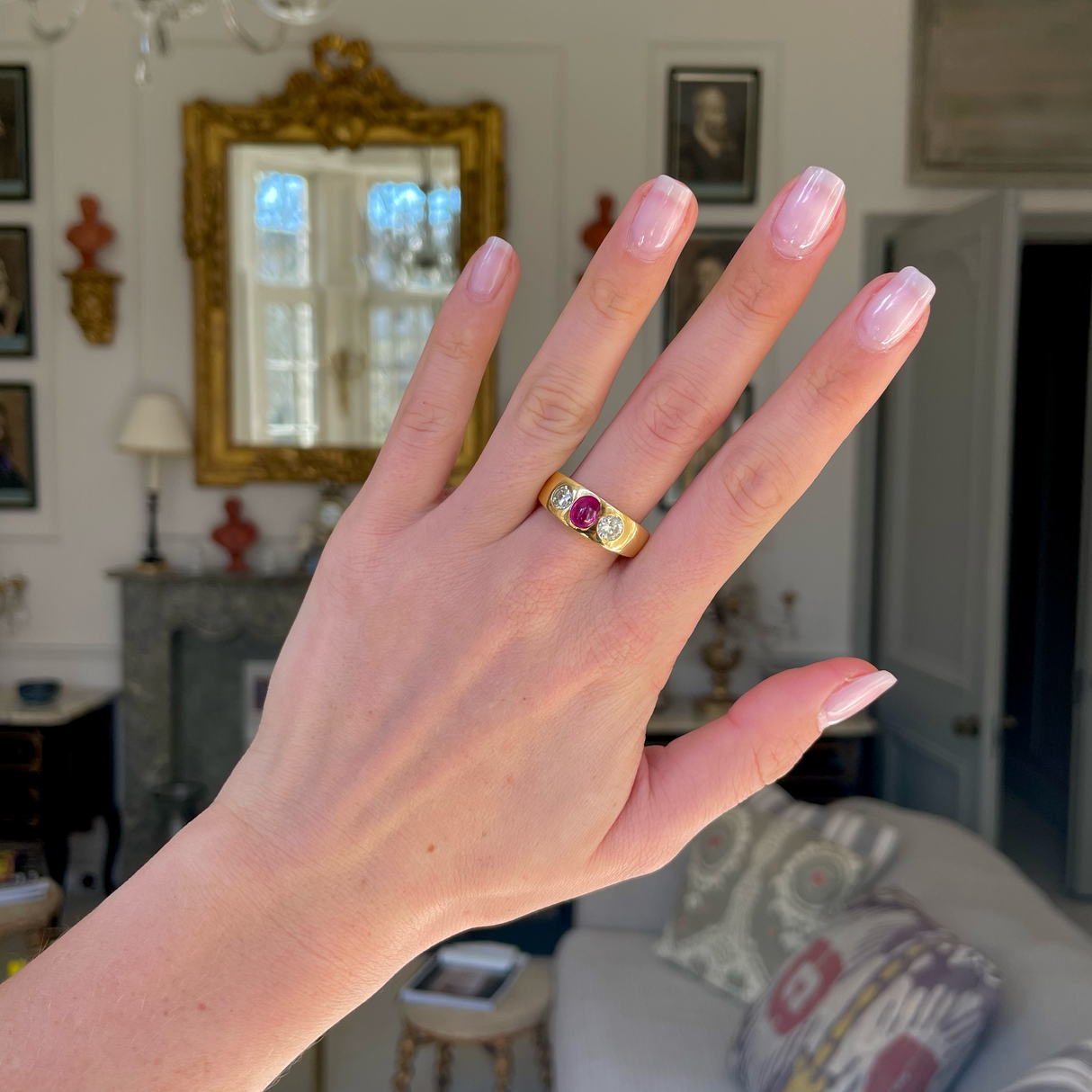 French cabochon ruby and diamond gypsy three stone ring, 18ct yellow gold