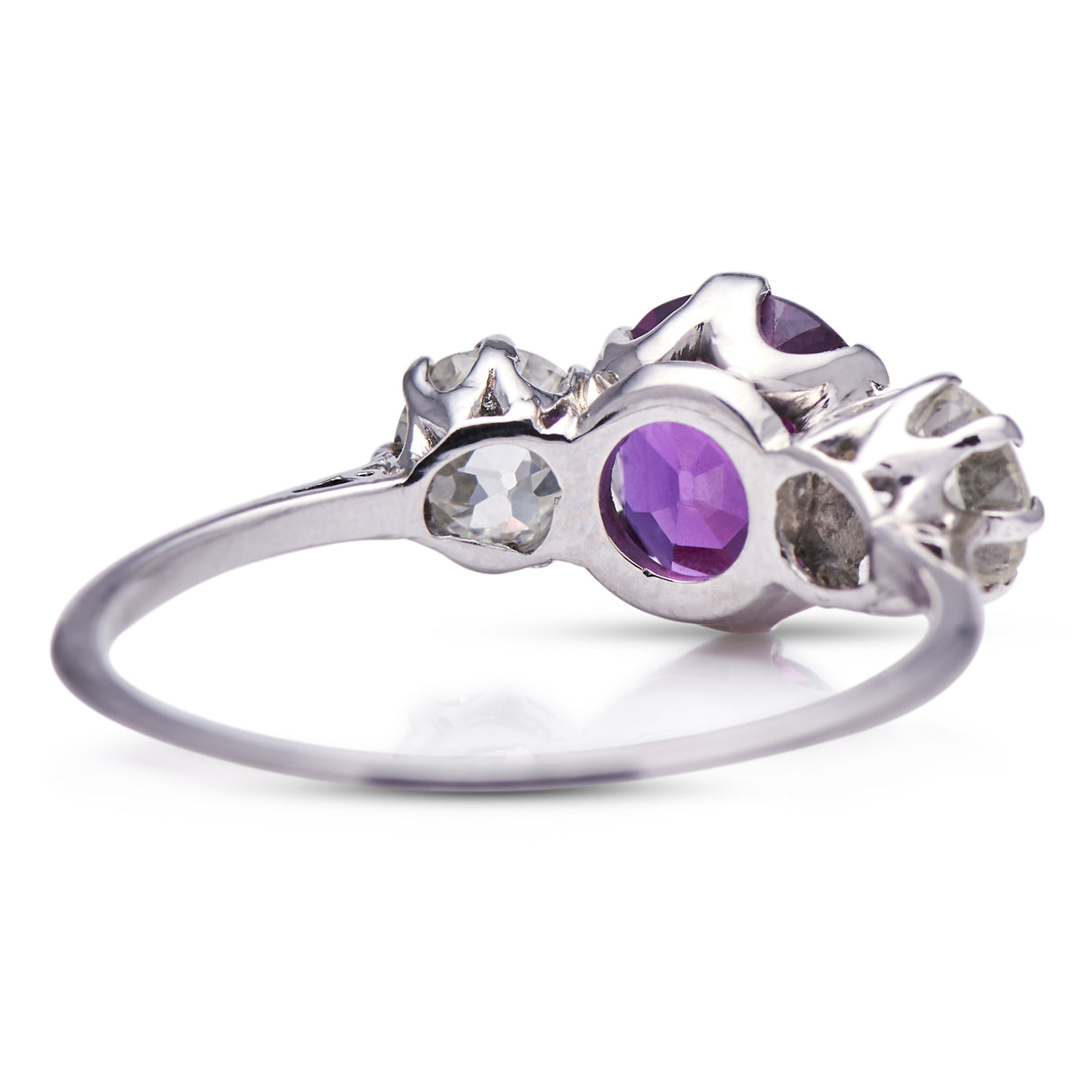 Art Deco, purple sapphire and diamond three-stone engagement ring, platinum