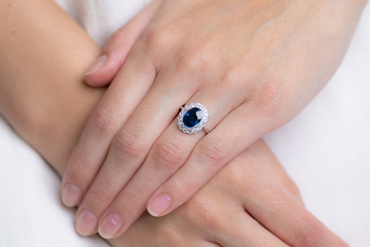 Vintage, 18ct White Gold, Sapphire and Diamond Cluster RingSapphire Antique Engagement Rings Sapphire Engagement Rings Diamond Engagement Rings Antique Rings Antique Ring Boutique Vintage Engagement Rings Antique Engagement Rings Antique Jewellery company Vintage Jewellery