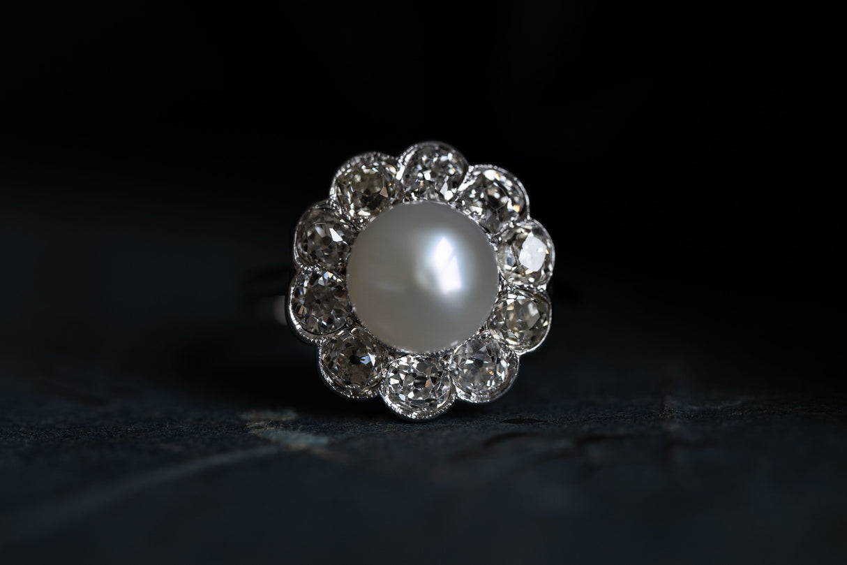 Edwardian, platinum, natural pearl and diamond cluster ring