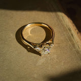 1.07ct diamond and side diamonds three stone engagement ring in yellow gold band