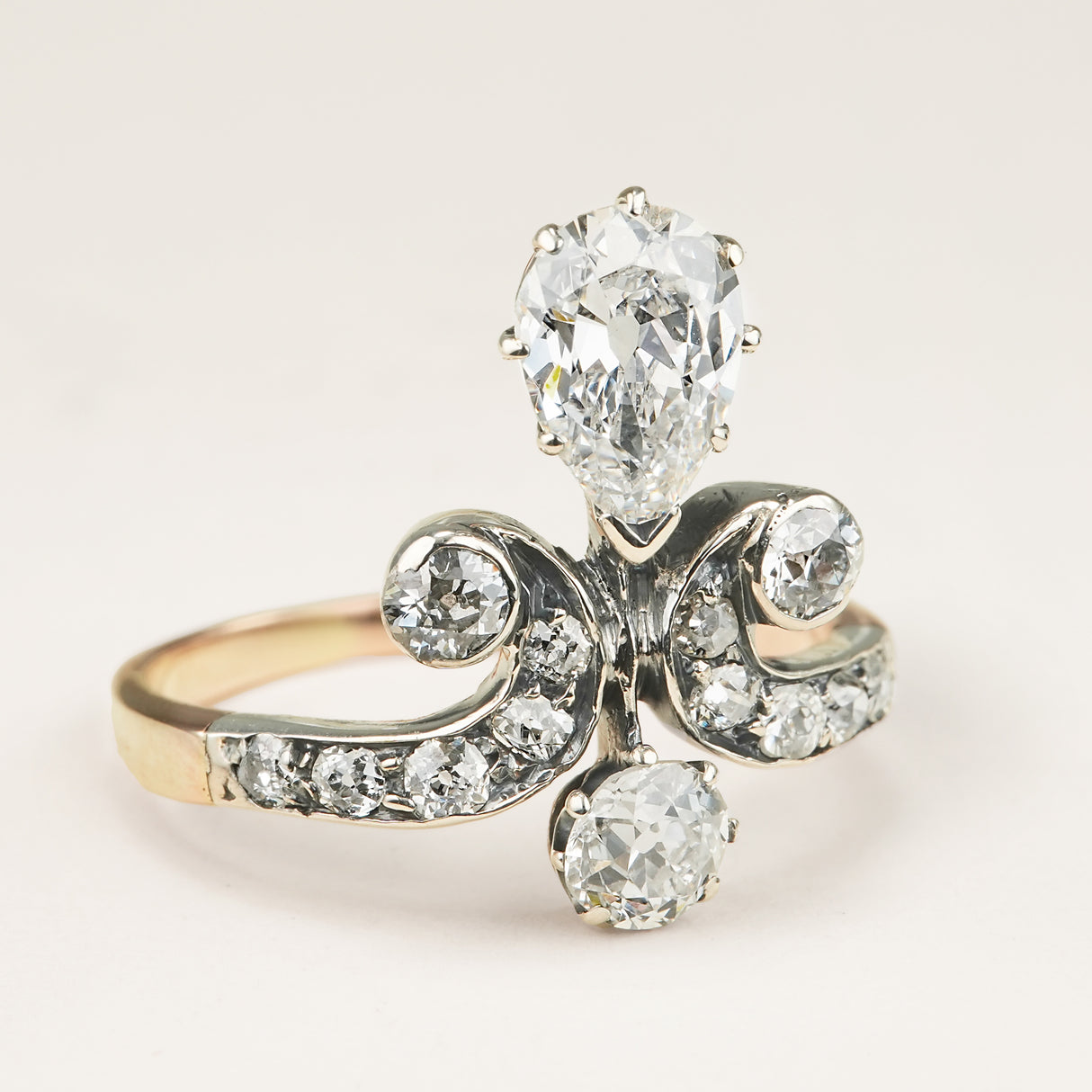 Antique, Edwardian pear cut diamond motif engagement ring