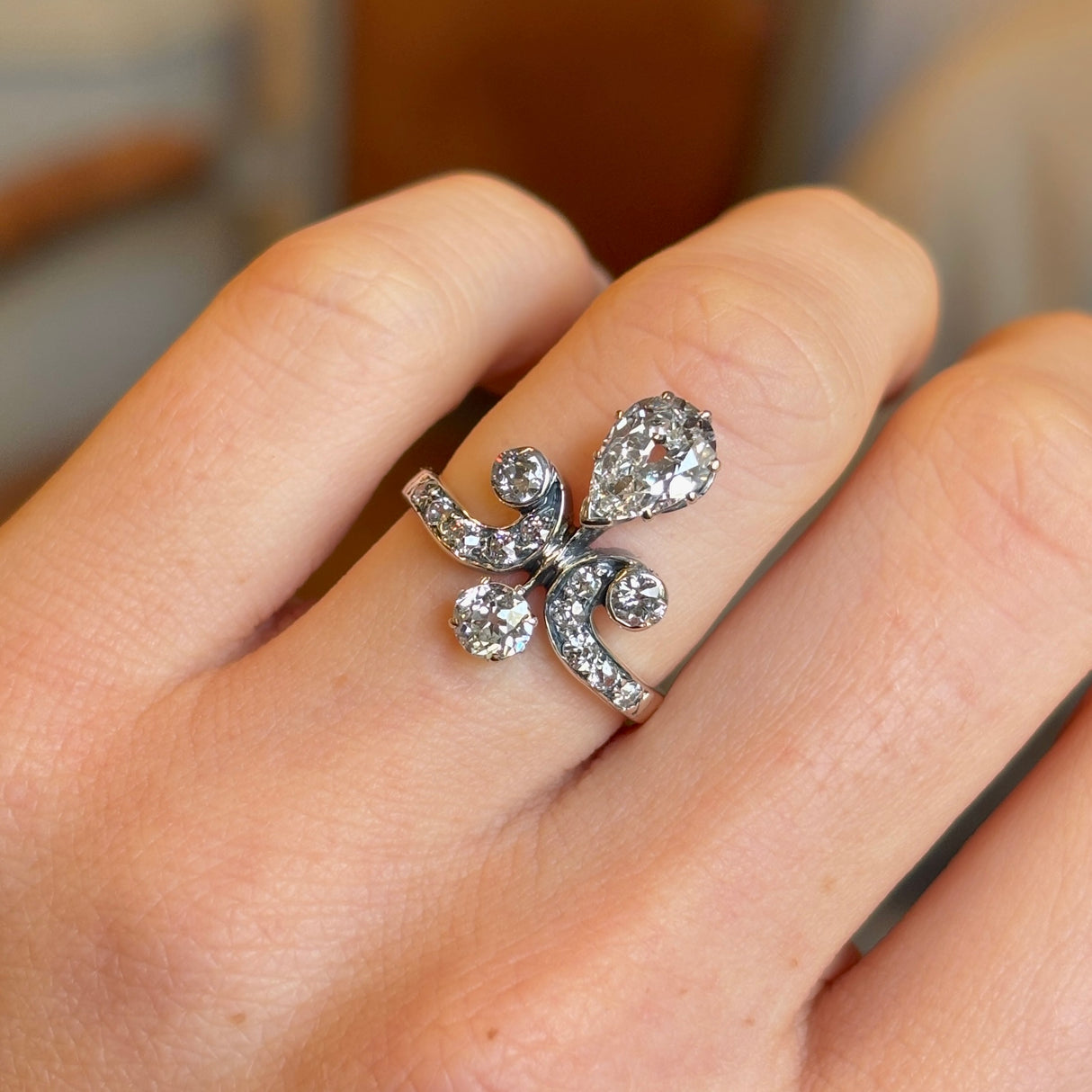 Antique, Edwardian pear cut diamond motif engagement ring