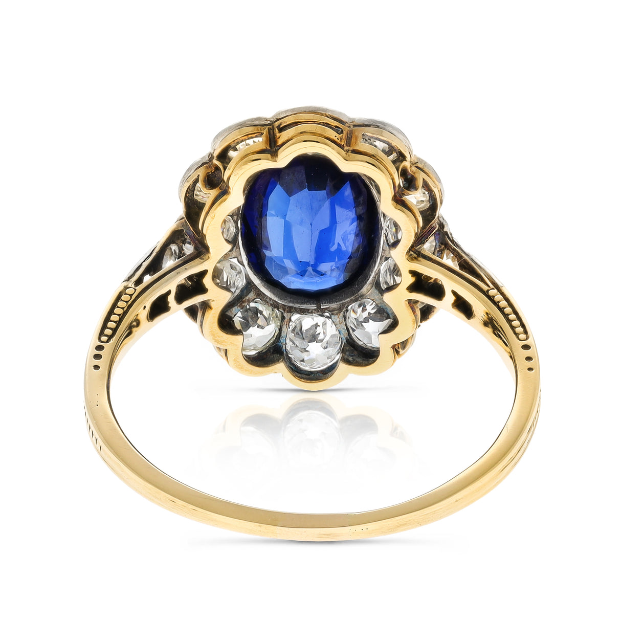 Antique royal blue sapphire and diamond cluster engagement ring, circa 1900