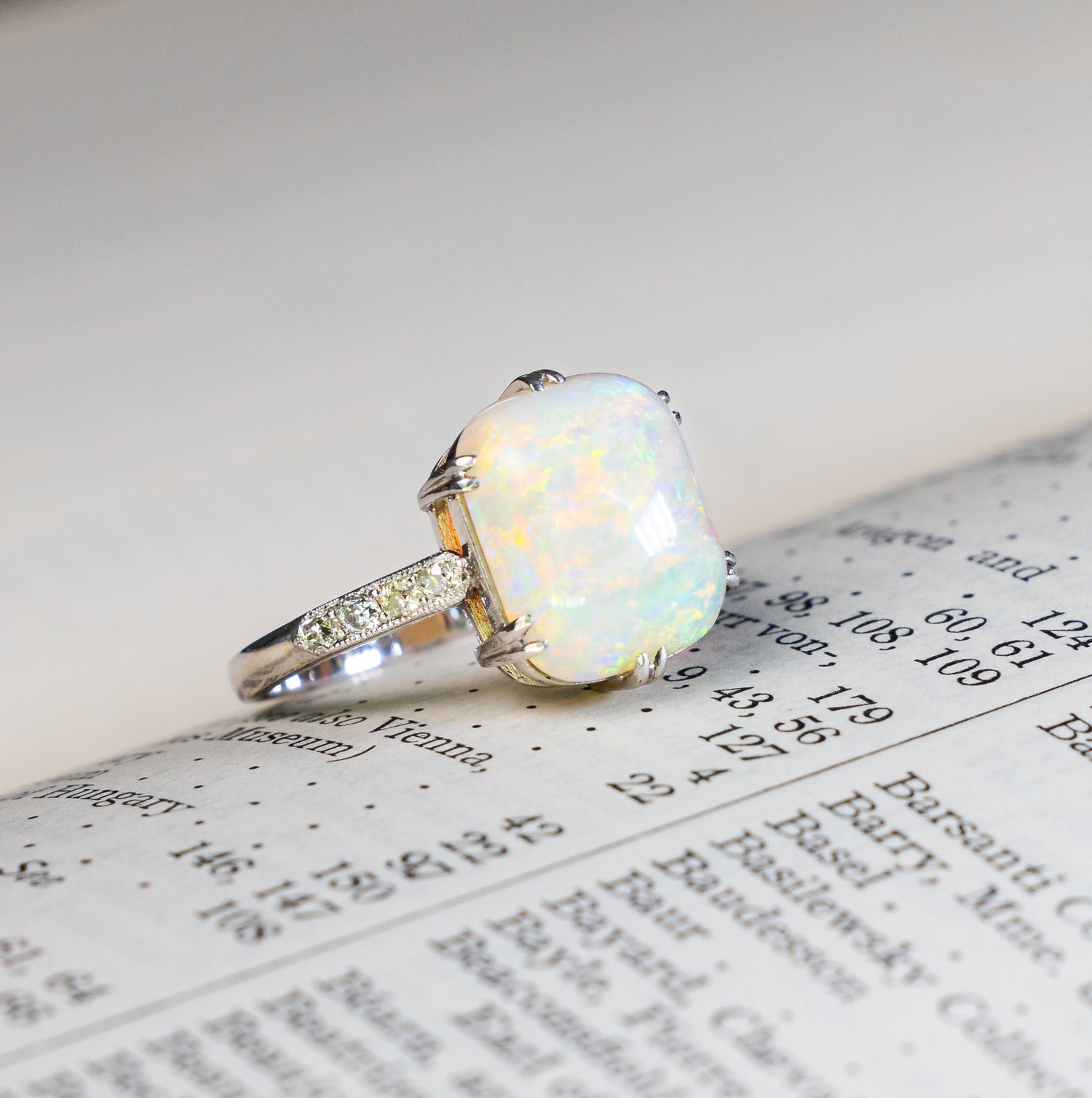 Vintage, Art Deco cabochon opal and diamond ring side