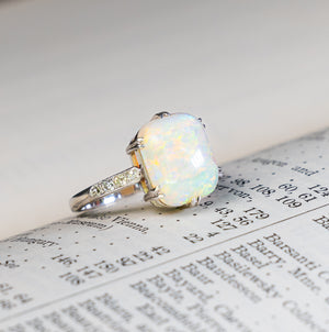 Vintage, Art Deco cabochon opal and diamond ring side