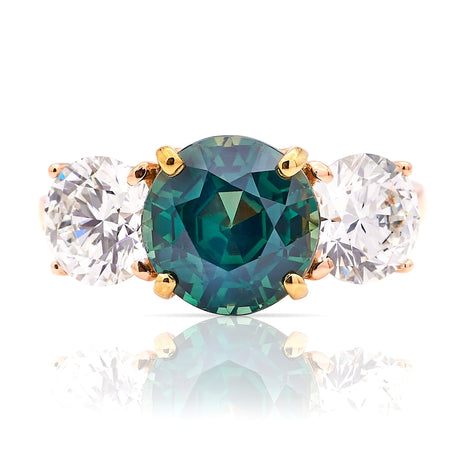 Vintage, teal sapphire and diamond three-stone engagement ring