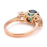 Vintage, teal sapphire and diamond three-stone engagement ring