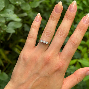 Vintage, 1980s three-stone diamond ring, platinum