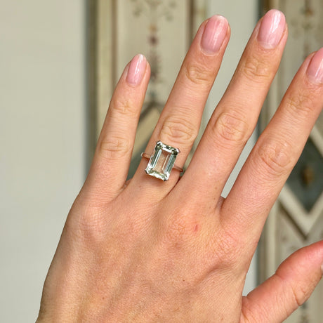 1879-Vintage, aquamarine single-stone ring worn on hand.