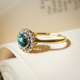 1920s vintage zircon and diamond cluster ring with round blue zircon