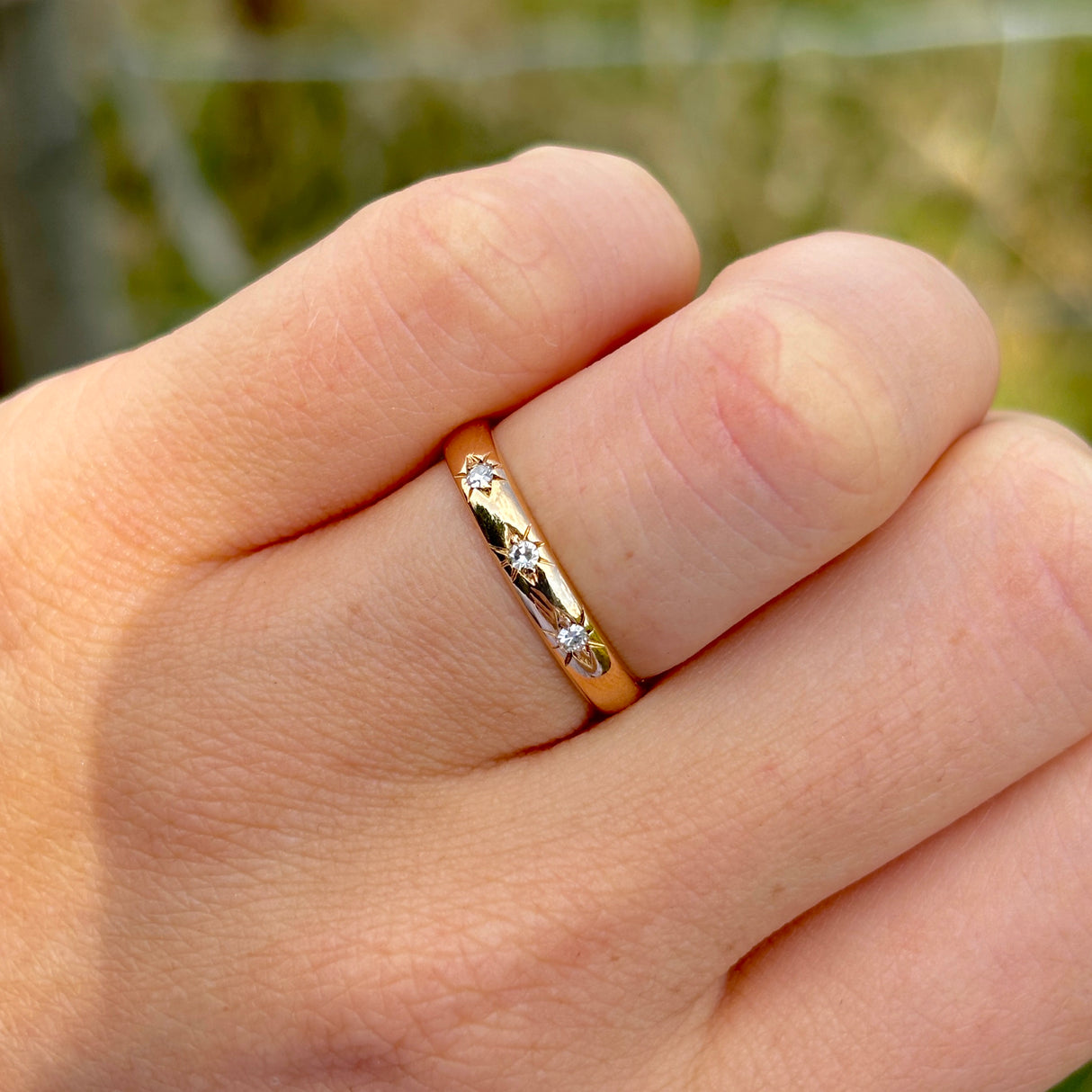 Vintage, 1960s three-stone diamond band