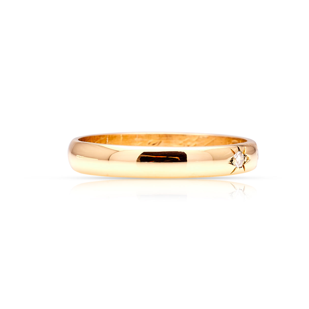 Vintage, 1960s three-stone diamond band worn on hand side