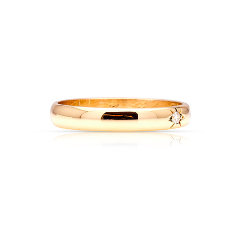 Vintage, 1960s three-stone diamond band worn on hand side