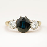 Vintage, 1950s dark blue sapphire and diamond three-stone engagement ring