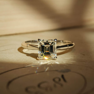 1980s diamond solitaire ring with square diamond in platinum