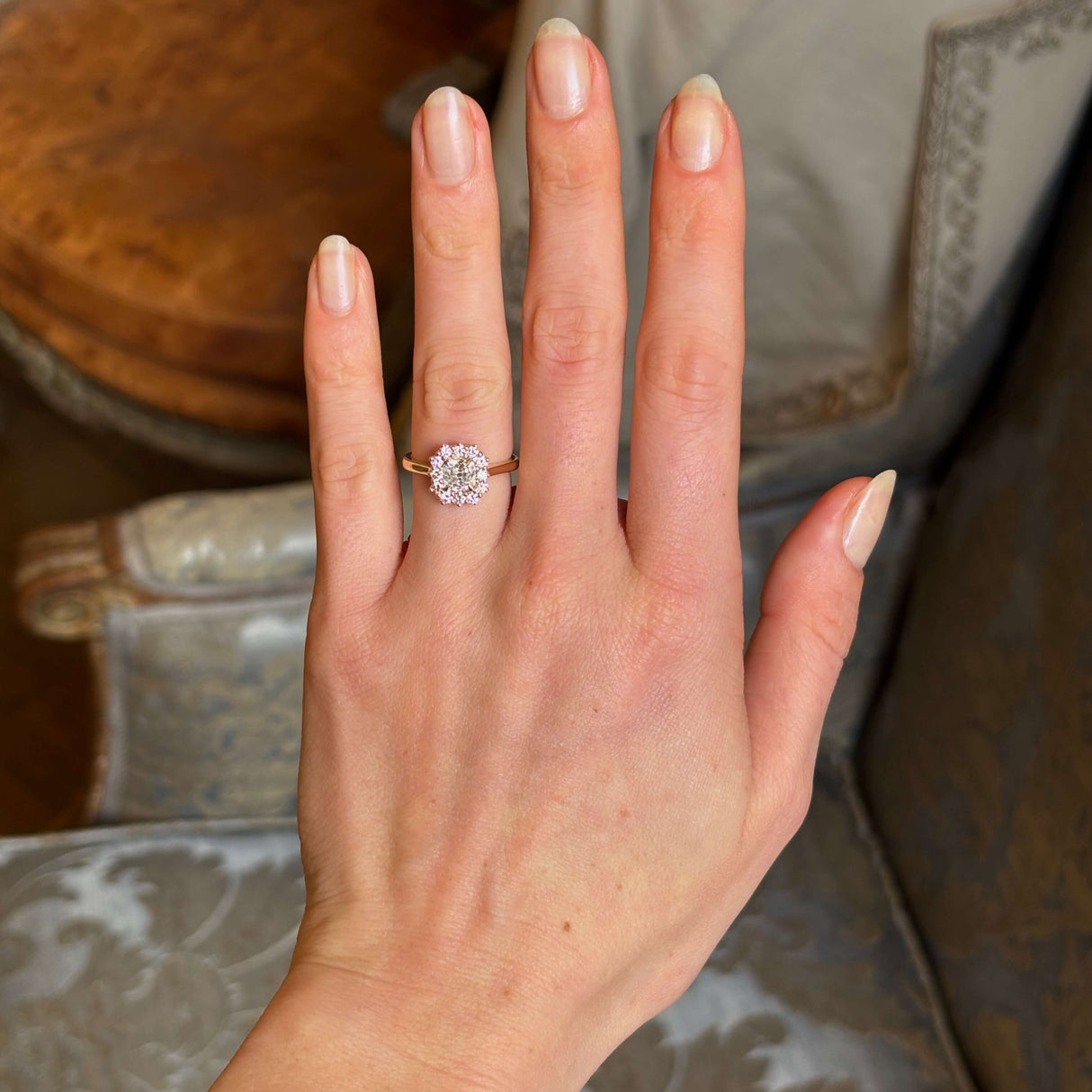 Diamond cluster engagement ring