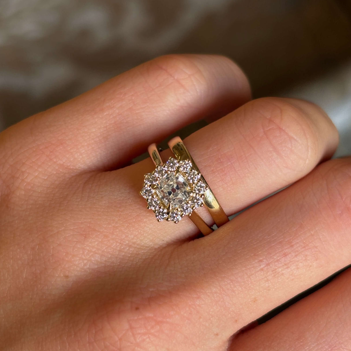Diamond cluster engagement ring