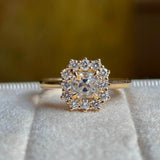 Diamond cluster engagement ring